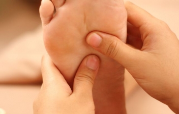 reflexology foot massage © photosoup
